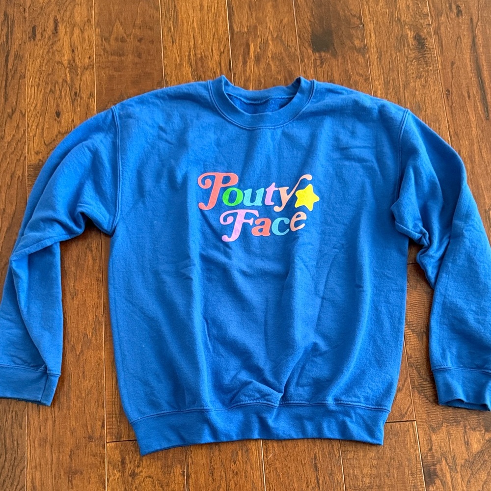 Addison Rae Blue Sweatshirt with Colorful Pouty Face Design